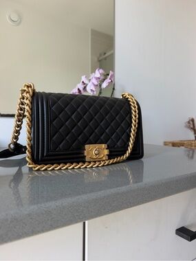 CHANEL Black Quilted Leather Boy Bag with Gold Chain